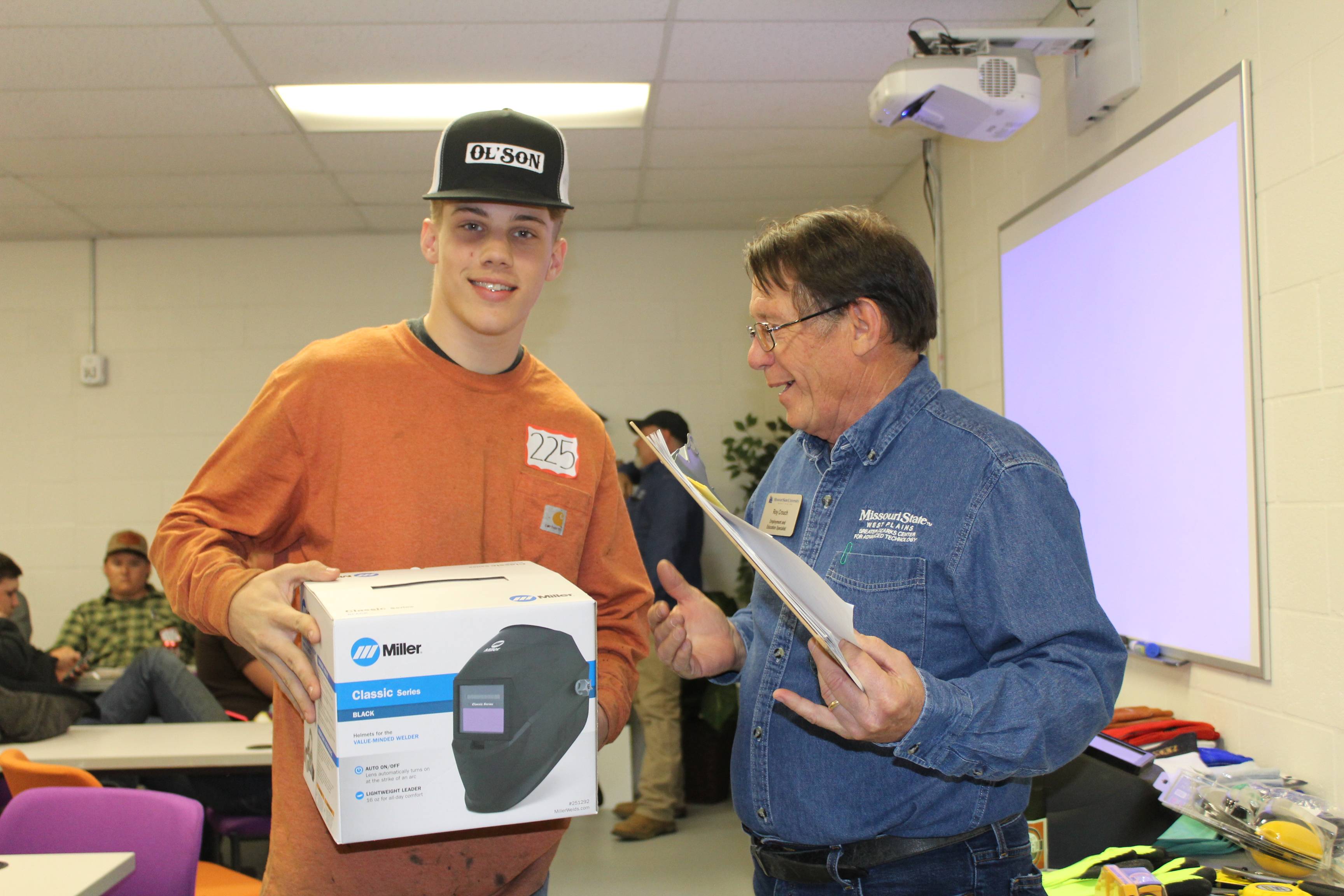 roy with student at welding competition 2022