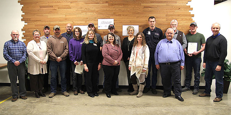 Group photo of the seventeen January 2019 Industrial Maintenance Apprenticeship program participants, employers and administrators.