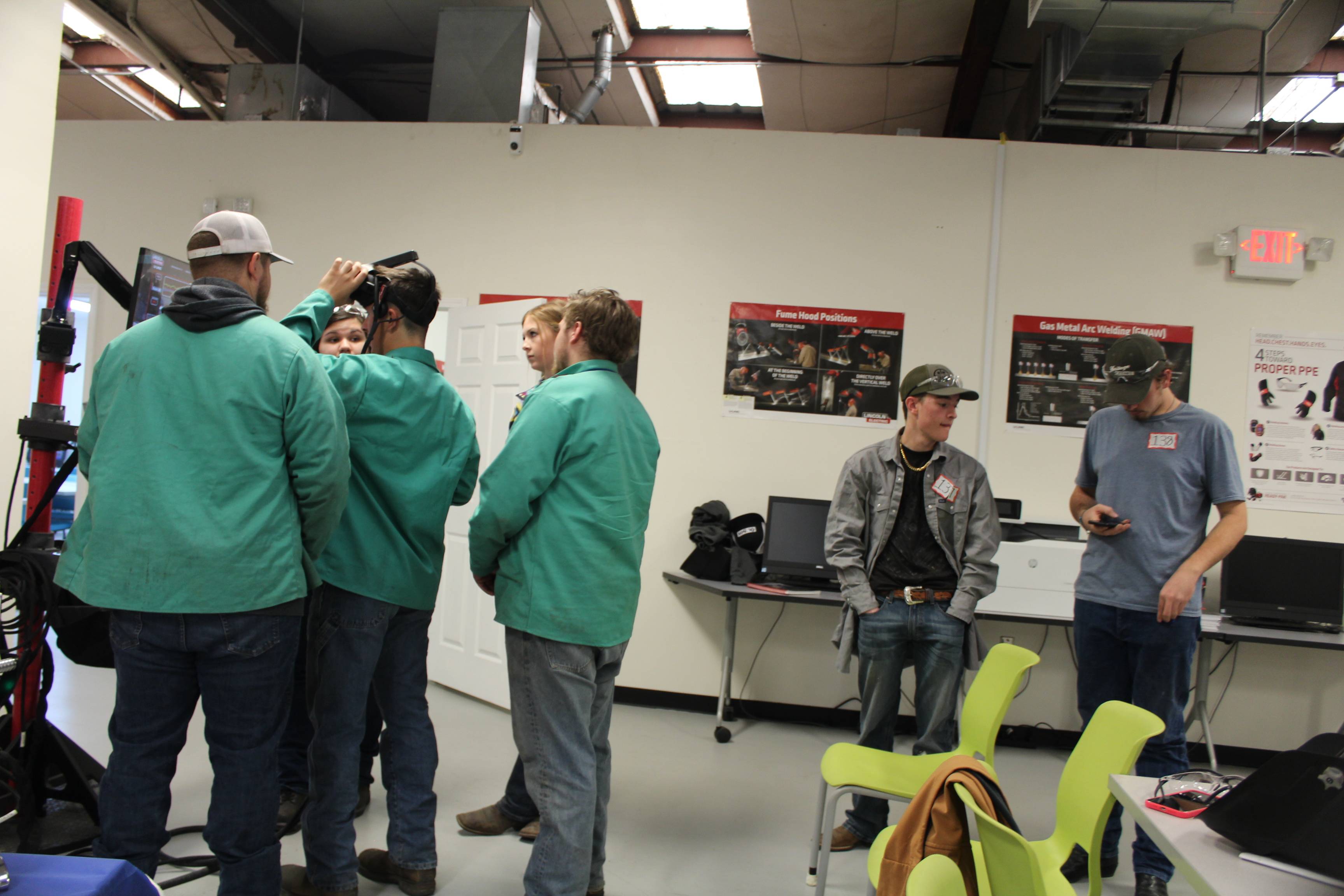 group of students at virtual reality welding